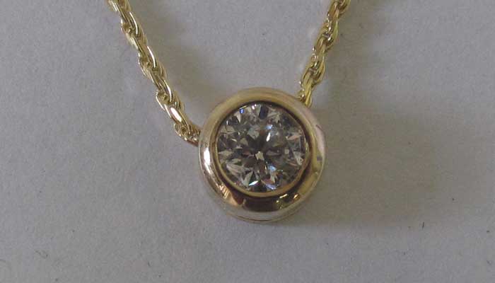 one diamond pendant